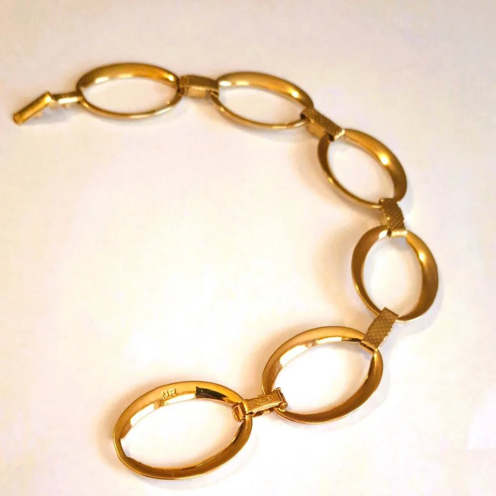 Avon gold tone